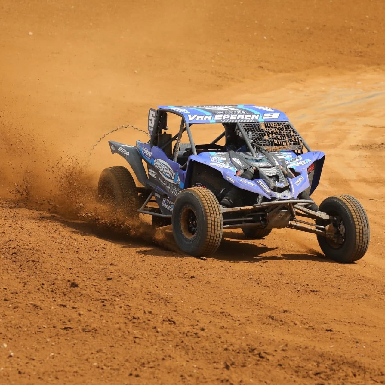 UTV racing through dirt